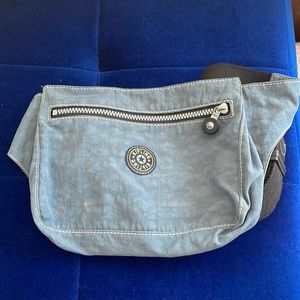 Light blue Kipling travel bag